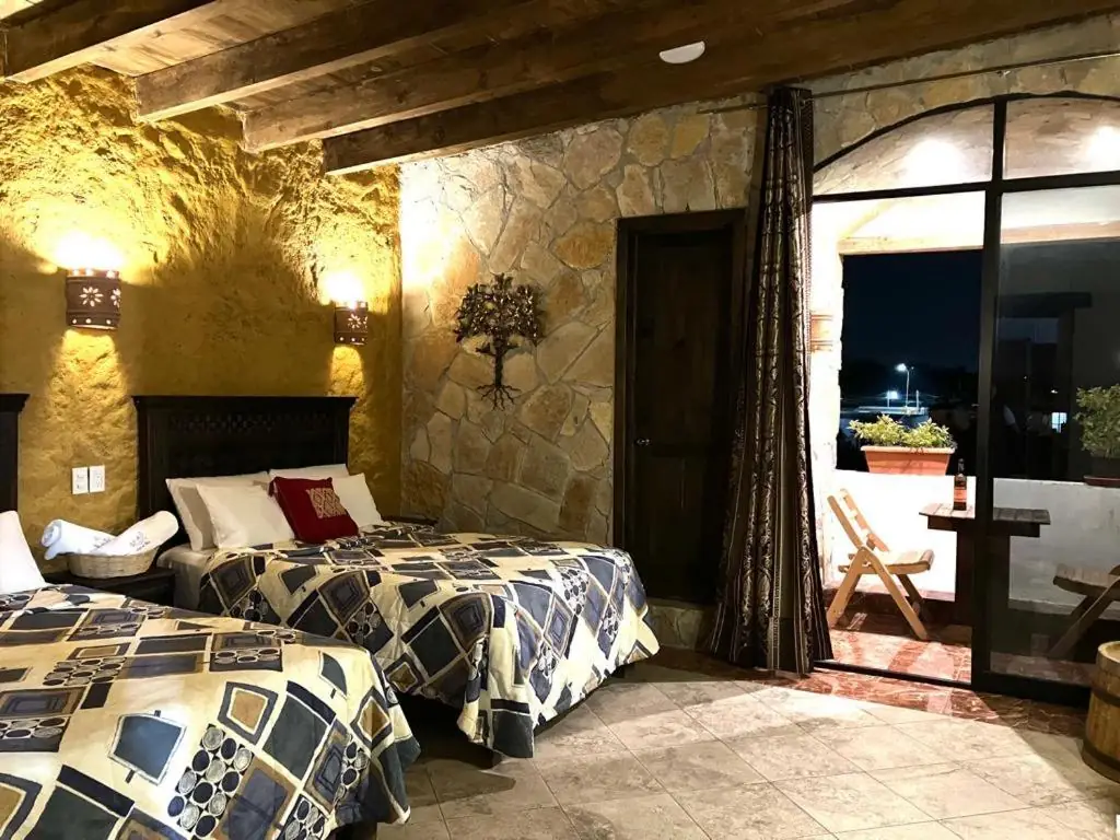 Rustic guest room at Hotel & Cava La Parroquia 2
