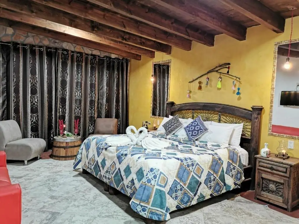 Rustic guest room at Hotel & Cava La Parroquia 1