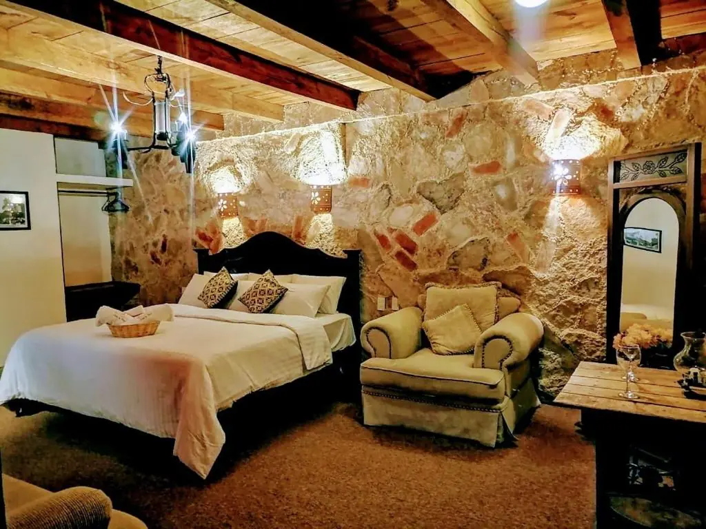 Rustic guest room at Hotel & Cava La Parroquia 3